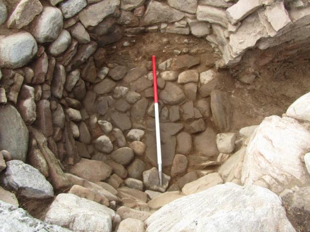 The kiln bowl, with its cobbled floor, post excavation looking west – note the exposed moraine